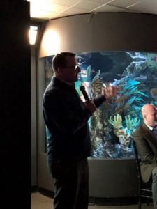 ceo mike jackowski speaks at the new england aquarium
