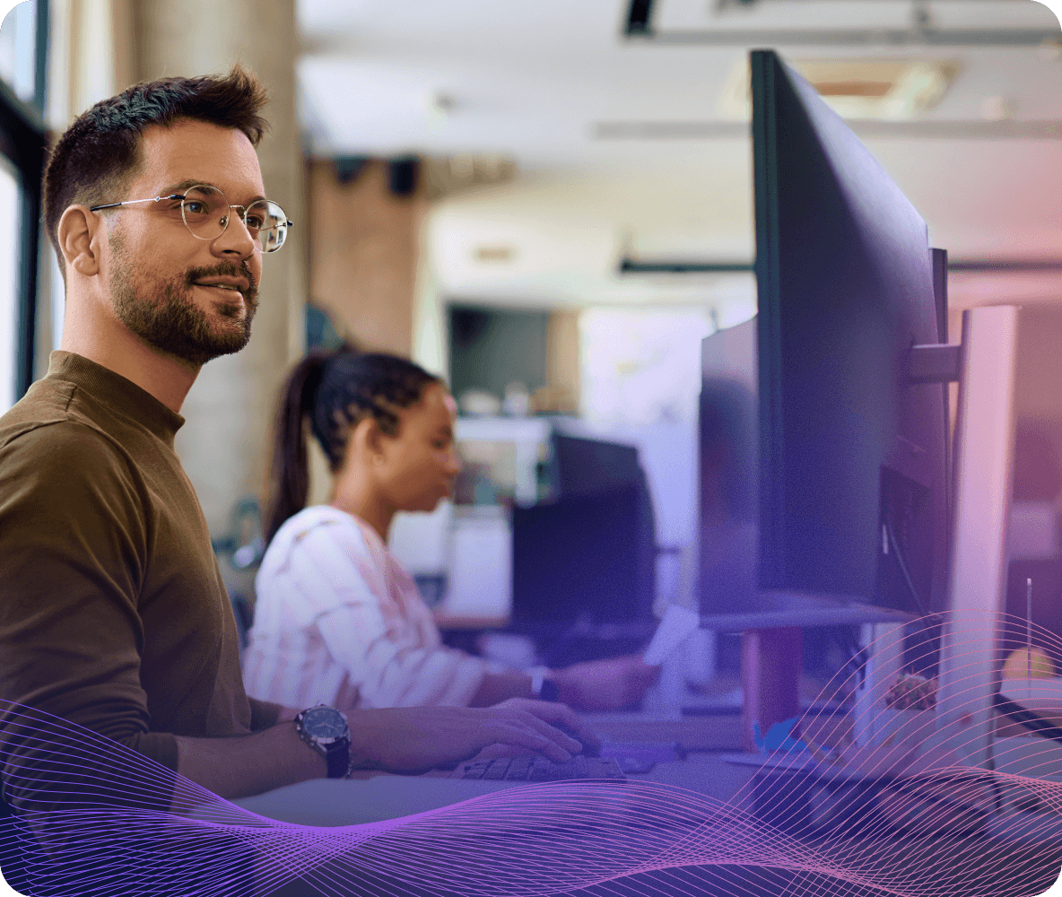 man working computer office team