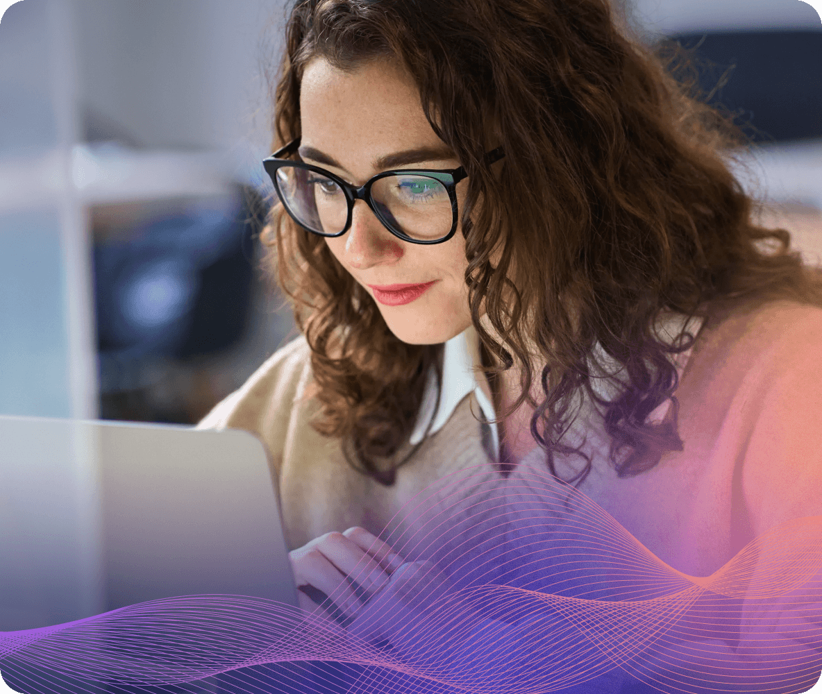 woman glasses focused laptop